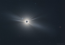 Only in the fleeting darkness of a total solar eclipse is the light of the solar corona easily visible Pictured here however using over  images and meticulous digital processing is a detailed wide-angle image of the Suns corona taken during the Great Amer