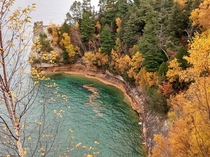 Our Pictured Rocks boat cruise was cancelled due to weather but we still got to enjoy the majesty of Miners Castle Pictured Rocks Munising MI x OC - my  daughter