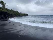 Pailoa black-sand Beach at Waianapanapa in Maui Hawaii 