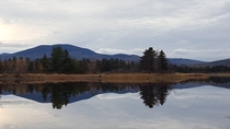 Perfect mirror lake in Stratton Maine OC  