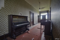 Piano amp Organ Inside a Corridor of an Abandoned s Stone House in Ontario Canada 
