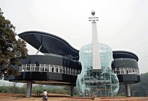 Piano and Violin shaped building reportedly designed by Hefei University of Technology and built in  to a scale of  - Huainan City China