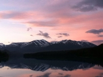 Pink sunrise and reflection Alaska
