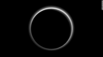Pluto Backlit showing Its Atmosphere 