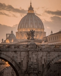 Ponte SantAngelo in Rome with St Peters Basilica in the background