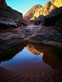 Pool reflection in a slot in Snow Canyon State Park 
