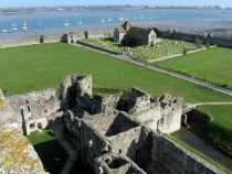Portchester Castle UKView of the outer bailey from the medieval keep showing the Norman church Saxon gate and Roman walls 