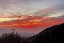 Pretty incredible sunset going on right now as viewed from the hills above Los Angeles 