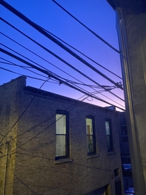 Pretty sky peeking through Chicago alley