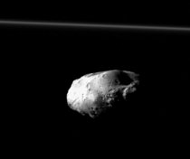 Prometheusthe tiny potatoe-shaped moon of Saturn is orbiting just inside Saturns F ring CreditCassini Imaging Team SSI JPL ESA NASA