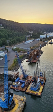 Railroad bridge sits on barge awaiting installation outside Portland OR