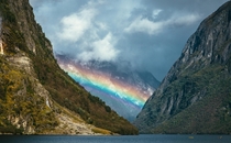 Rainbow inside of Naeroyfjord Norway 
