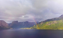 Rainbow over the coast of Tjong Norway  OC