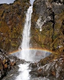 Rainbow through a waterfall - Arthurs Pass National Park New Zealand 