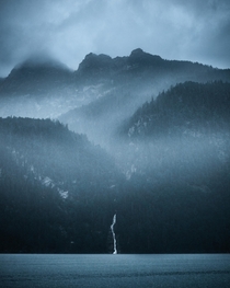 Rainy mountain view at the cleanest lake in Germany Knigssee  IG- susonsjack