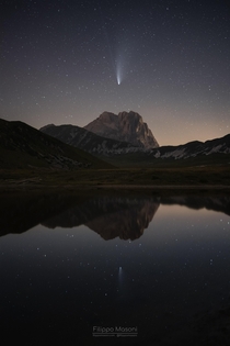 Reflection of NEOWISE and Corno Grande in a small lake 