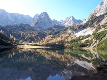 Reflections of the Mieminger Chain Eastern Alps in Lake Seebensee in autumn Tyrol Austria 