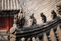 Roof ridge figurines of a traditional Chinese house in Luoyang China 