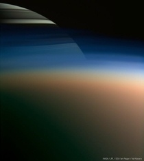 Saturn through Titans haze On March  just minutes after the Cassini spacecrafts closest approach to Titan Cassini viewed Saturn peeking through Titans thick atmosphere