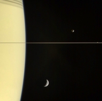 Saturn with  of its moons Tethys Mimas and Janus Tiny Janus lies on the plane of the rings