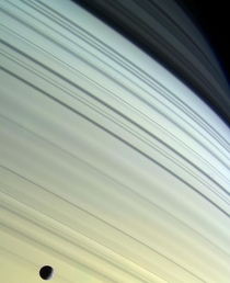 Saturns moon Mimas on its orbit Taken by the Cassini spacecraft and processed by Kevin Gill 