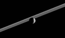 Saturns moon Mimas which has an -mile-wide  kilometers crater called Herschelsee image NASAs Cassini spacecraft took this scenic shot of Mimas in  as the sun lit up the crater