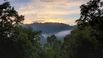 Scout Mountain NC shrouded by mist at sunset 