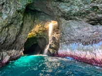 Sea cave on the Na Pali Coast of Kauai HI 