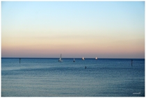 Serenely sailing towards dusk Barcelona  