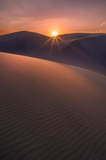 Setting Sun over the Dunes Colorado  IG adamcwatts