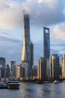 Shanghai Tower touching the clouds 
