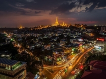 Shwedagon temple overlooks Yangon Myanmar Brett Rylance 