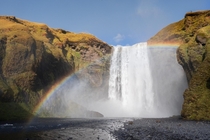 Skgafoss waterfall in Iceland with rainbow 