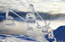 Ski Lifts covered in snow  By unknown