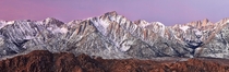 Snow blowing off peaks of the Sierra from Alabama Hills CA 