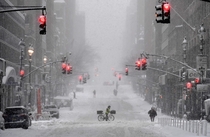Snow-covered street in midtown New York City February  Angela Weiss 