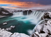 Snow Fall Waterfall in Godafoss Iceland by Elia Locardi 