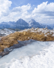 Snow melt in June Val Formin Italy 