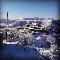 Snowclad village in Uttarakhand India 