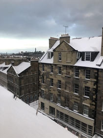 snowy view of edinburgh from the comfort of my warm bed