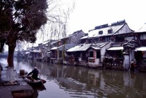 Snowy village on a canal Xitang China 