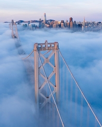 Some rare low fog under the bay bridge in San Francisco