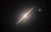 Spiral galaxy Messier  widely known as the Sombrero 