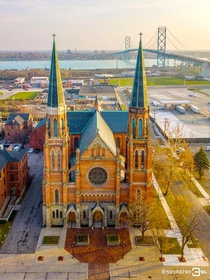 St Annes Basilica and the Ambassador Bridge Detroit MI USA
