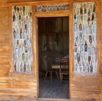 Stained glass windows at a bar in Castle Dome AZ ghost town circa late s
