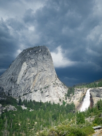 Storm clouds rolling in over Liberty Cap Yosemite 