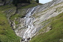 Stream exploiting stratigraphy in the Swiss Alps 