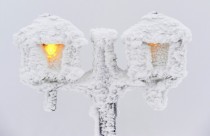 Street lights coved in snow and ice Feldberg mountain Germany 