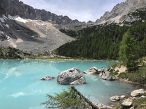 Stunning blue of the Lago di sorapis in the Italian Dolomites 