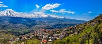 Stunning view of the mountain village of Bsharri Lebanon in spring The mountains are snow-capped year-round and it is the home to the ancient forest known as the Cedars of God 